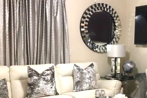 Add A Silver Wall Mirror To The Living Room