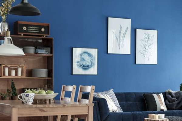 Statement Gallery Wall In Navy Blue Dining Room